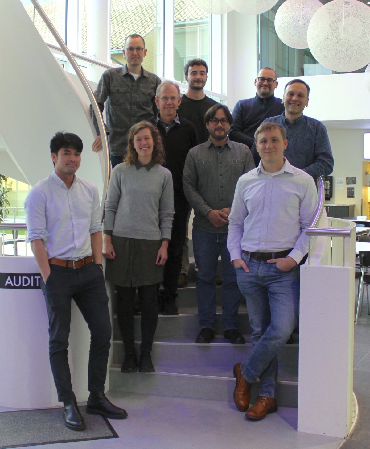 Photo of the Aarhus team: First author, Ewan McRae (front right), lead the research effort. Other authors contributed to design, structural characterization, and supervision of the study. Photo by Ida Johanne Haugaard Sørensen.
