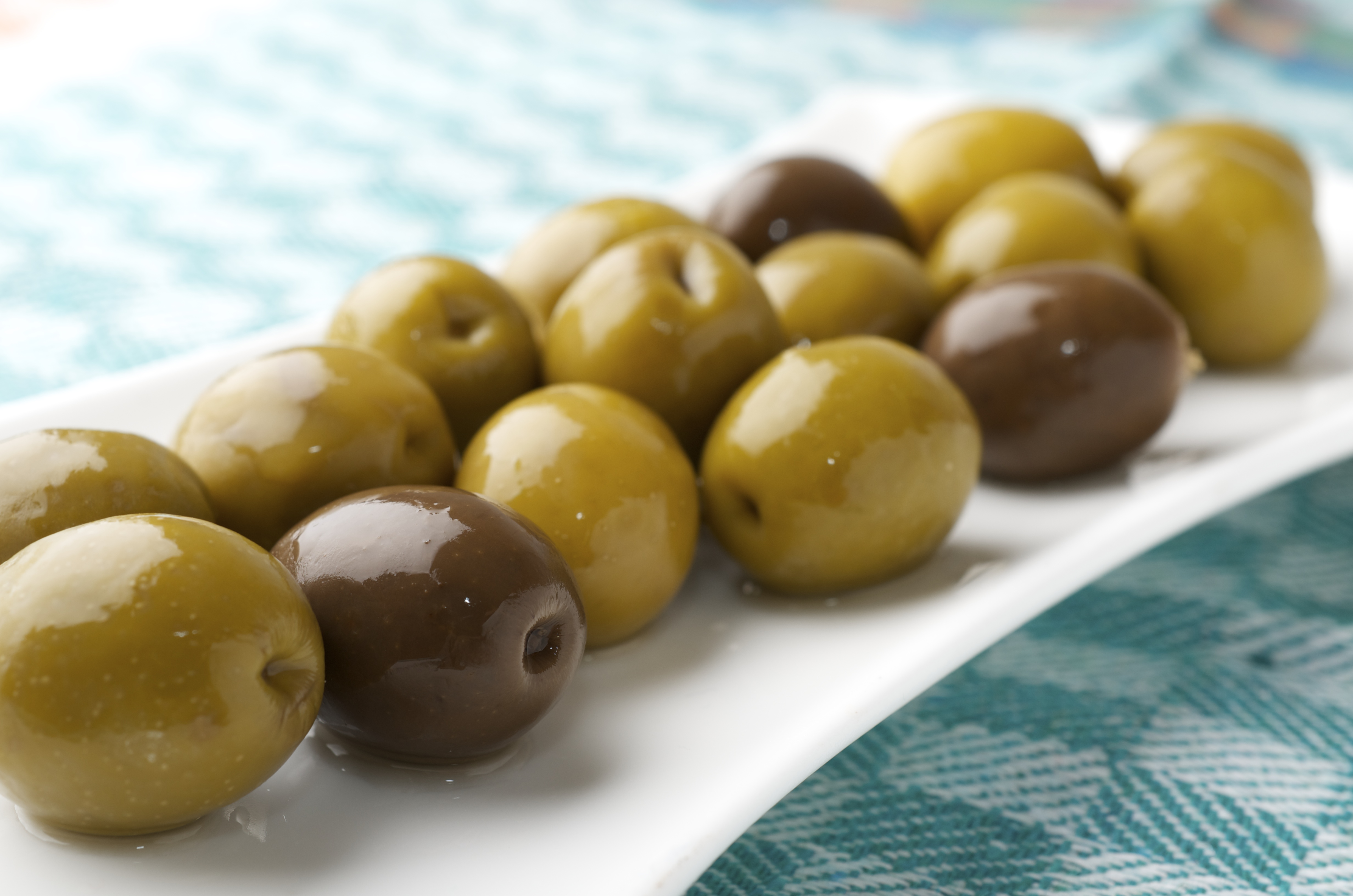 Dr. Hossein Mohammad-Beigi and Professor Daniel Otzen, Aarhus University,  shows that a specific and widely common strain of olives excels as a natural inhibitor of Parkinson’s disease progress. (Image: Colourbox.com)